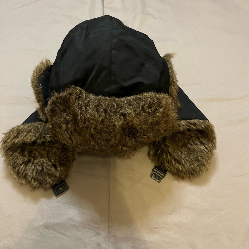 Winter faux fur hat in black color